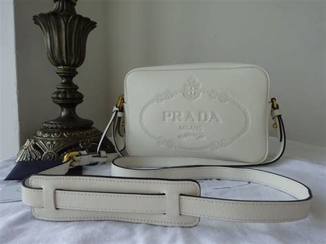 white prada camera bag|Altro.